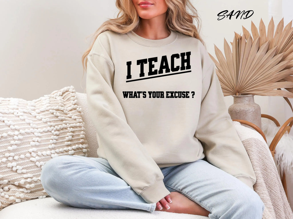 Sand: Woman wearing sand colored I teach whats your excuse sweatshirt ideal teacher appreciation gift