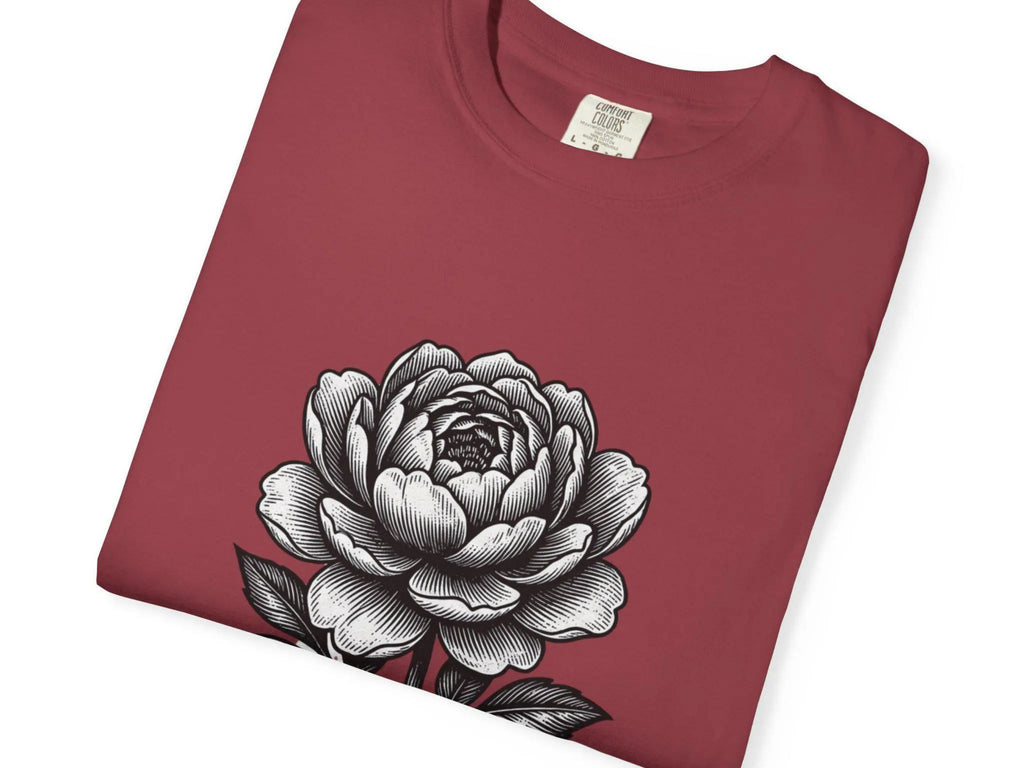Maroon t-shirt with a black and white floral design on a white background