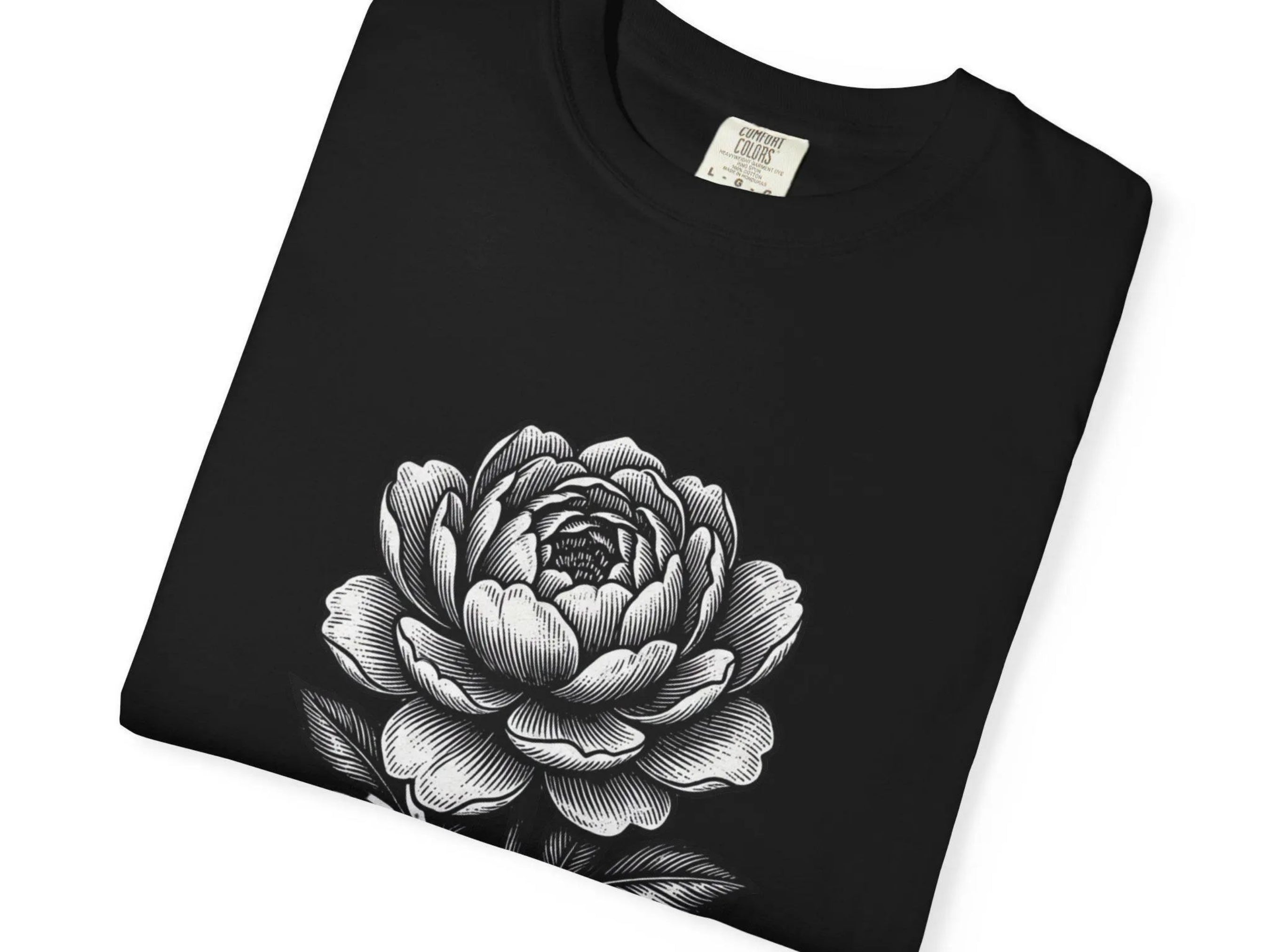 Black t-shirt with a white floral design on a white background