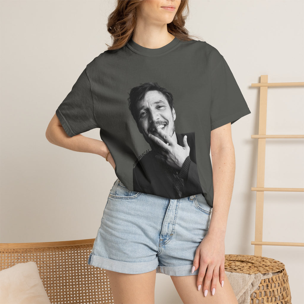 Person wearing a t-shirt with a graphic design of a man's face.