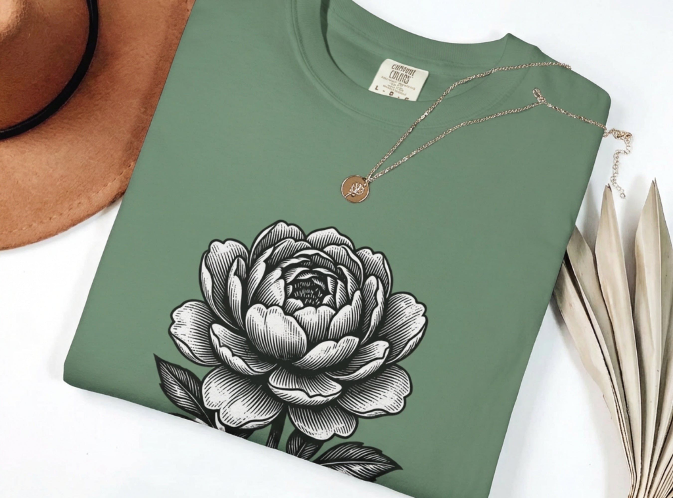 Sage green t-shirt with a black and white botanical peony flower illustration makes a great gardener gift